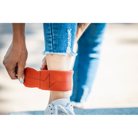 Bracelet lesté cheville en orange, douleurs au genou, douleur hanche, musculation bas du corps, matériel musculation